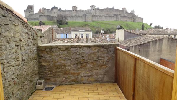 APPARTEMENT RENOVE AVEC TERRASSE VUE CITE