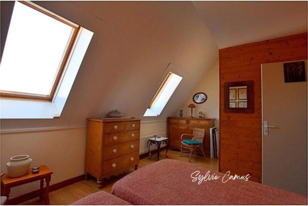 VIAGER OCCUPÉ – Opportunité patrimoniale à Saint-Genest-Lerpt (42) Duplex inversé avec vue panoramique exceptionnelle