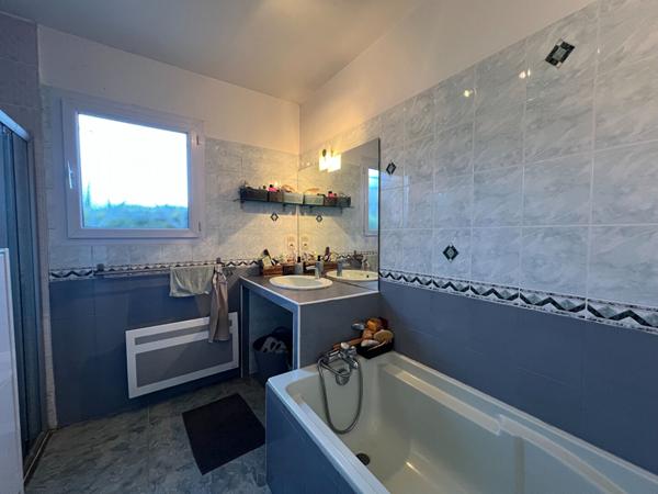 A vendre Maison contemporaine plain-pied bourg de Benquet 4 chambres jacuzzi garage