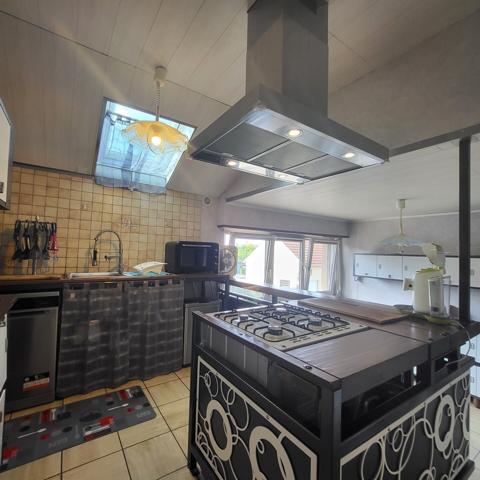 Appartement / Maison Atypique – 126 m² - 2 chambres - 4 garages