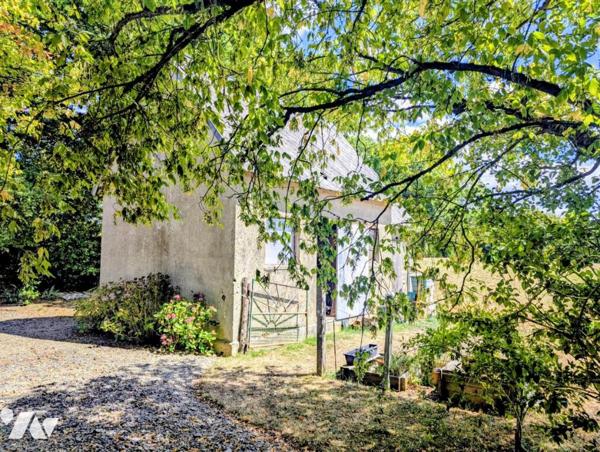 Maison en pierre avec dépendances – Terrain arboré de 2 046 m²
