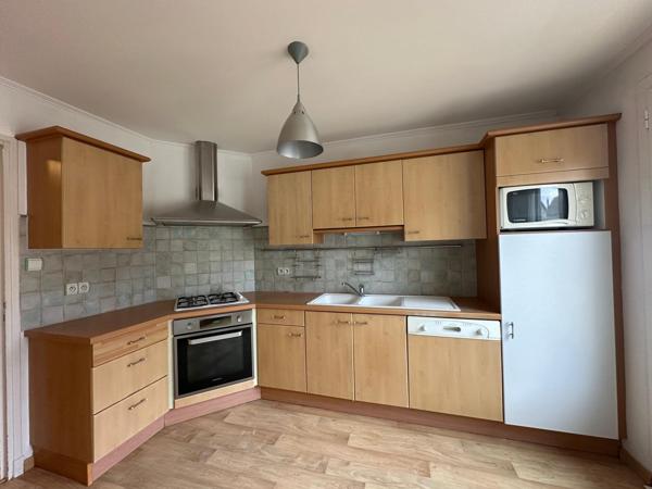 IMMEUBLE AVEC GARAGE ET JARDIN