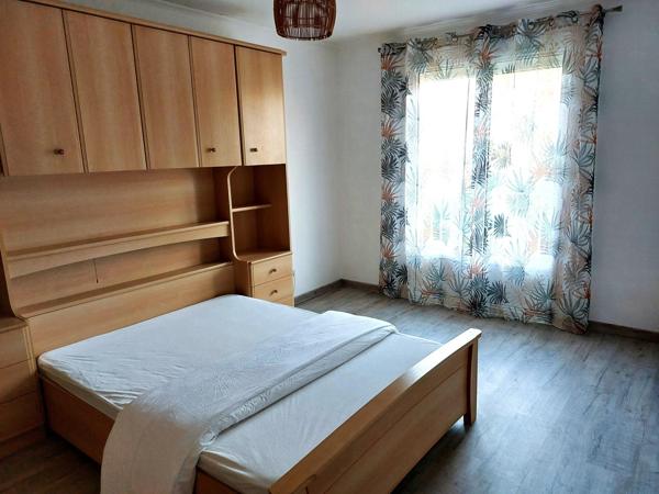 IMMEUBLE AVEC GARAGE ET JARDIN