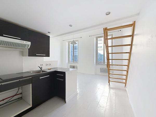 Très beau duplex au coeur du centre