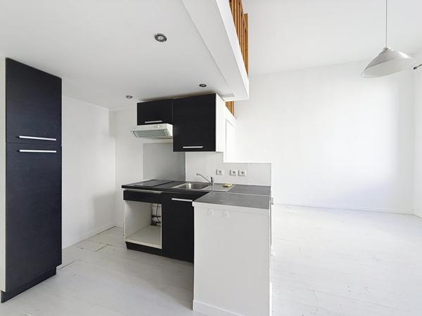 Très beau duplex au coeur du centre