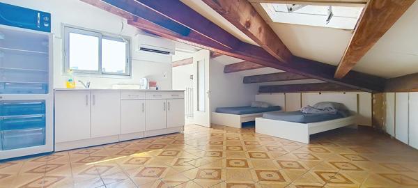 IMMEUBLE A USAGE DE BUREAUX