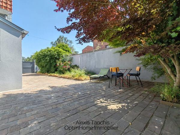 Exclusivité – Maison semi-mitoyenne avec cachet, garage & jardin S/O – Marcq Centre