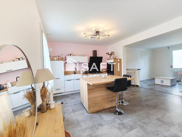 Jolie maison d'une surface habitable de 79 m2 avec terrain attenant de 465 m2.