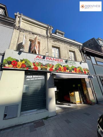 Une immeuble à usage de commerce et d'habitation vendu loué
