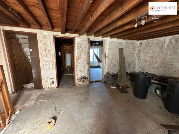 Une immeuble à usage de commerce et d'habitation vendu loué