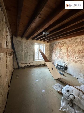 Une immeuble à usage de commerce et d'habitation vendu loué