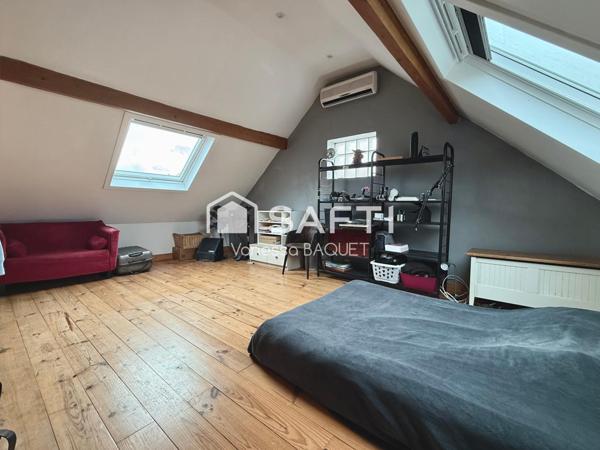 Élégante maison familiale de 178 m², 4 chambres, idéalement située proche gare et commerces.