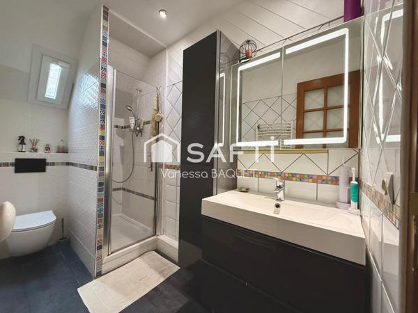 Élégante maison familiale de 178 m², 4 chambres, idéalement située proche gare et commerces.