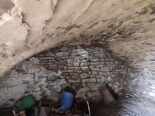 Terrain avec bâtisse