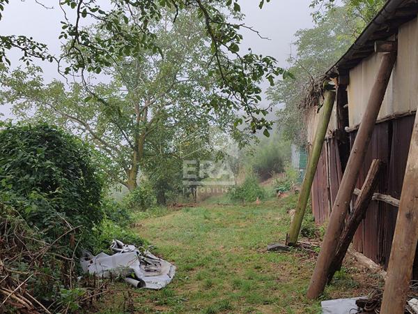 Terrain avec bâtisse