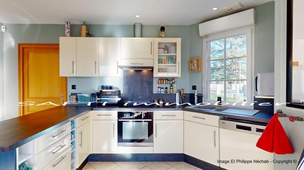 Maison Plain-pied de 114m2 avec 3 chambres, garage, chalet bois et grand jardin de1460m2 parfaitement clos.