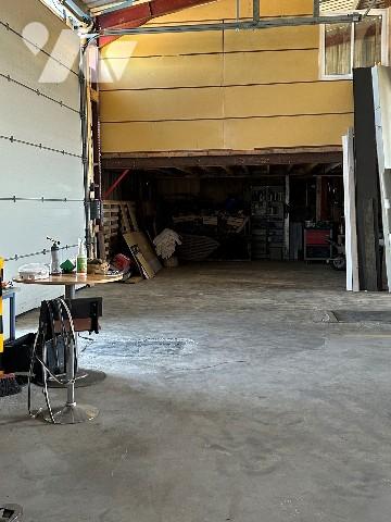 Bien mixte à usage de garage avec partie habitation en duplex et possibilité loft