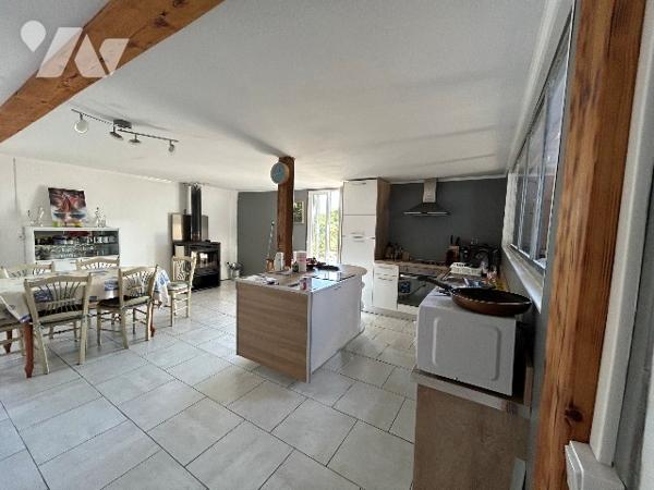 Bien mixte à usage de garage avec partie habitation en duplex et possibilité loft