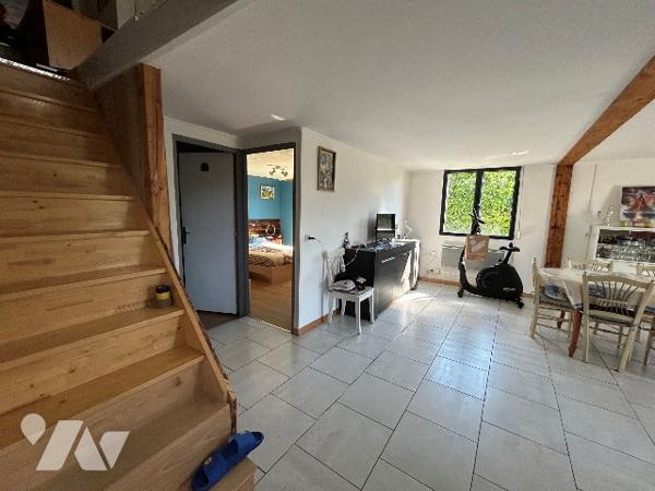 Bien mixte à usage de garage avec partie habitation en duplex et possibilité loft