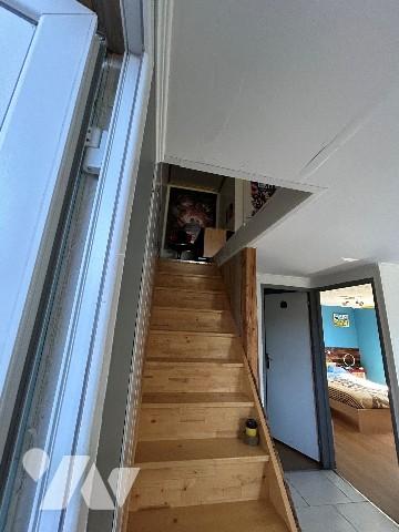 Bien mixte à usage de garage avec partie habitation en duplex et possibilité loft