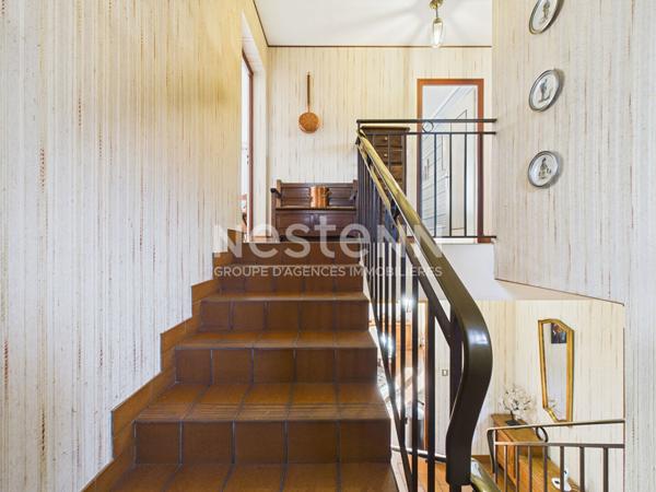 A vendre à Aurillac, quartier Belbex, sur terrain clos d'environ 600m², Maison de type 4 d'une surface de 111 m²