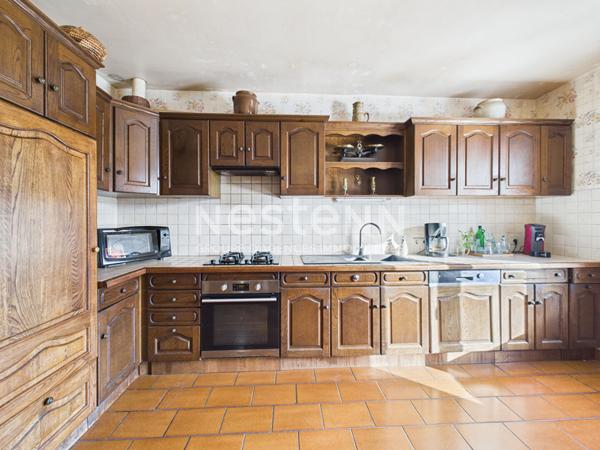 A vendre à Aurillac, quartier Belbex, sur terrain clos d'environ 600m², Maison de type 4 d'une surface de 111 m²