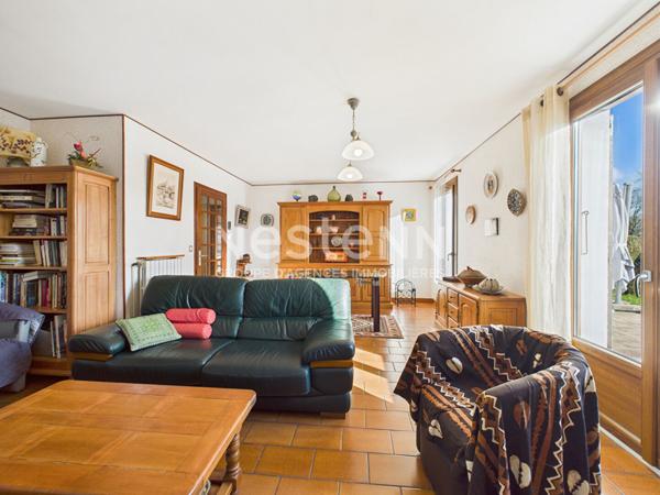 A vendre à Aurillac, quartier Belbex, sur terrain clos d'environ 600m², Maison de type 4 d'une surface de 111 m²