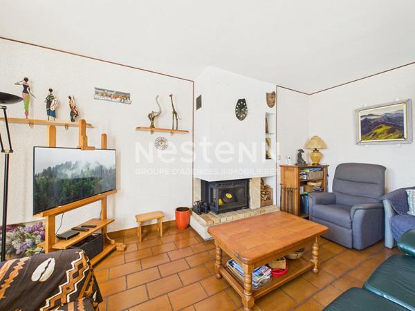 A vendre à Aurillac, quartier Belbex, sur terrain clos d'environ 600m², Maison de type 4 d'une surface de 111 m²