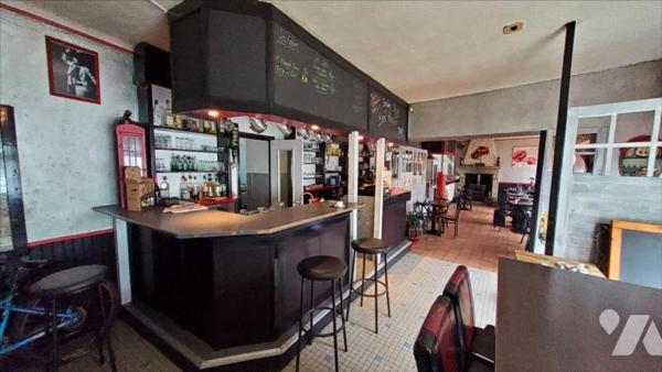 HUELGOAT - IMMEUBLE D'HABITATION ET COMMERCE