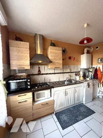 Centre LUNEVILLE - Appt de 57m² de type T2, + balcon de 11m², ascenseur, cellier, garage et parking.