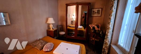 Maison de bourg avec garage et grand jardin