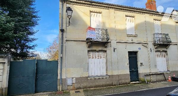Maison de bourg avec garage et grand jardin
