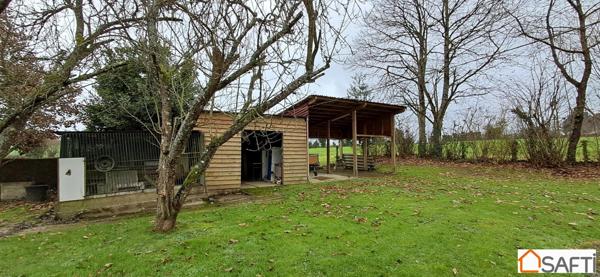 Maison de campagne en pierre 9 pièces double garag