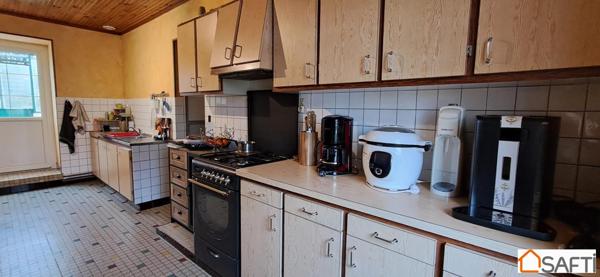 Maison de campagne en pierre 9 pièces double garag