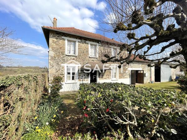 Jolie maison ancienne avec garage, cadre de rêve!
