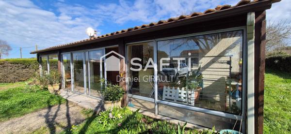 Maison T3 véranda et annexe, terrain de 1216 m²