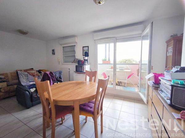 Appartement T2 avec balcon vue dégagée, ascenseur, parking privatif et résidence sécurisée