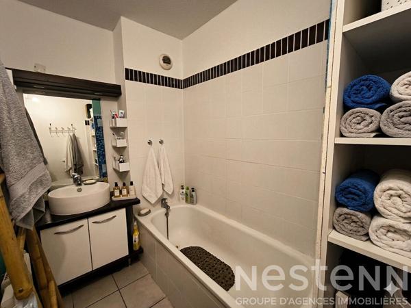 Appartement T2 avec balcon vue dégagée, ascenseur, parking privatif et résidence sécurisée