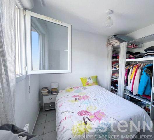 Appartement T2 avec balcon vue dégagée, ascenseur, parking privatif et résidence sécurisée