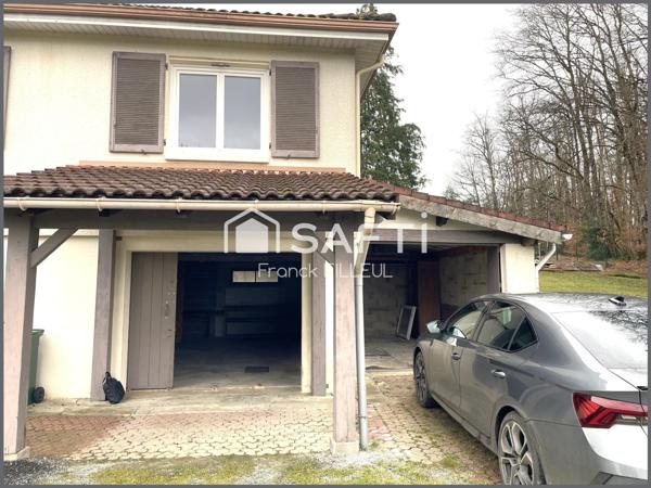 Belle maison au calme avec garages et son parc