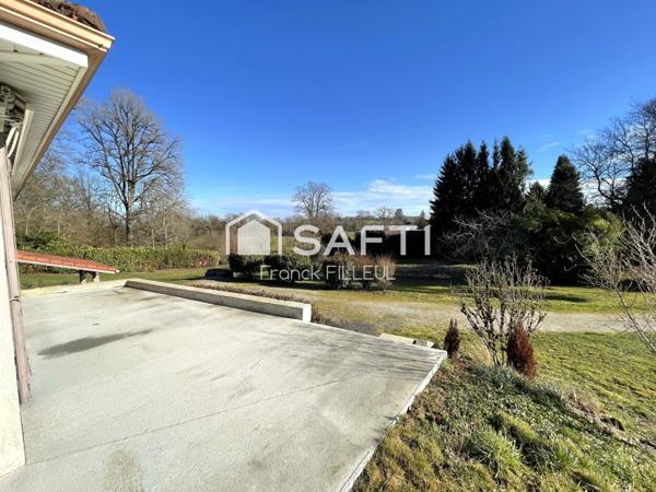 Belle maison au calme avec garages et son parc