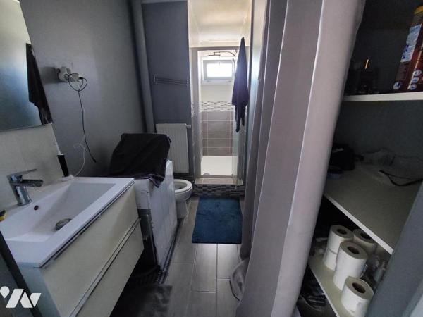 APPARTEMENT + CAVE + PLACE DE PARKING PRIVATIVE