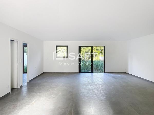 Maison plein pied avec jardin et garage