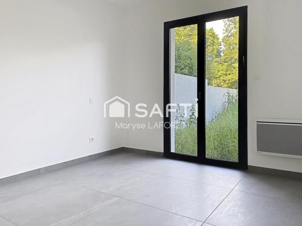 Maison plein pied avec jardin et garage