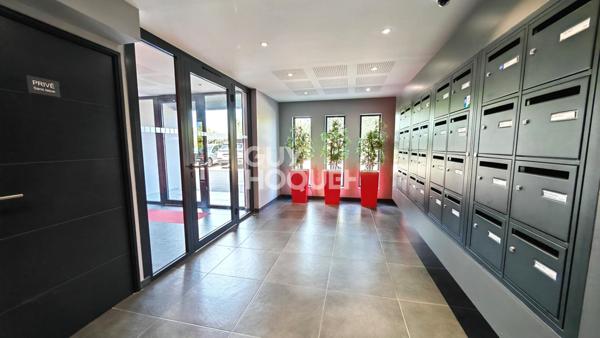 A VENDRE - CANET EN ROUSSILLON - Duplex de prestige 3 pièces avec vue panoramique, terrasses et garage.