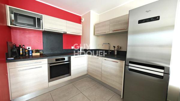 A VENDRE - CANET EN ROUSSILLON - Duplex de prestige 3 pièces avec vue panoramique, terrasses et garage.