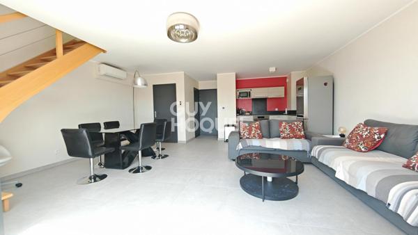 A VENDRE - CANET EN ROUSSILLON - Duplex de prestige 3 pièces avec vue panoramique, terrasses et garage.