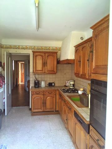 Maison familiale de 93 m² avec jardin arboré et véranda