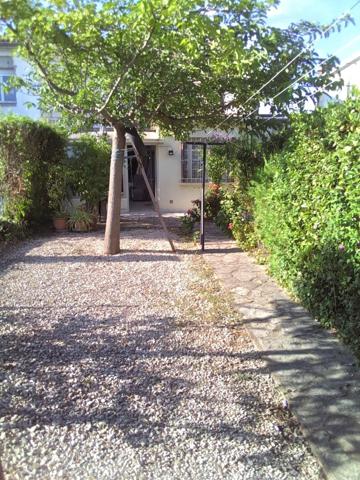 Maison familiale de 93 m² avec jardin arboré et véranda