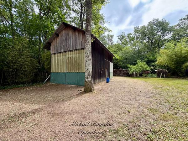 Terrain de loisirs de 4 900 m² avec hangar et espace habitable